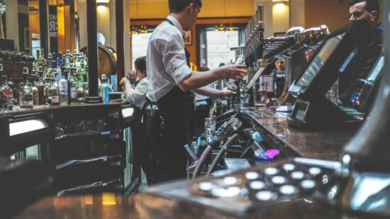 busy bartenders behind bar