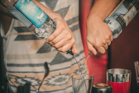 pouring liqours into shot glass