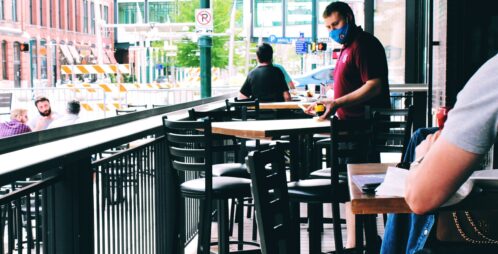 bussing tables at bistro