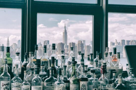liquor bottles with city skyline