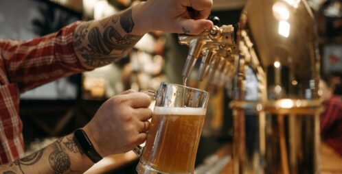 pouring beer from tap