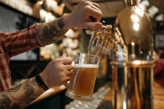 pouring beer from tap