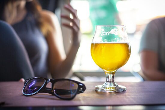 glass of beer and sunglasses