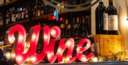 illuminated WINE sign