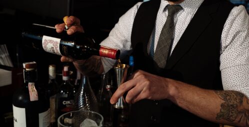 bartender pouring shot